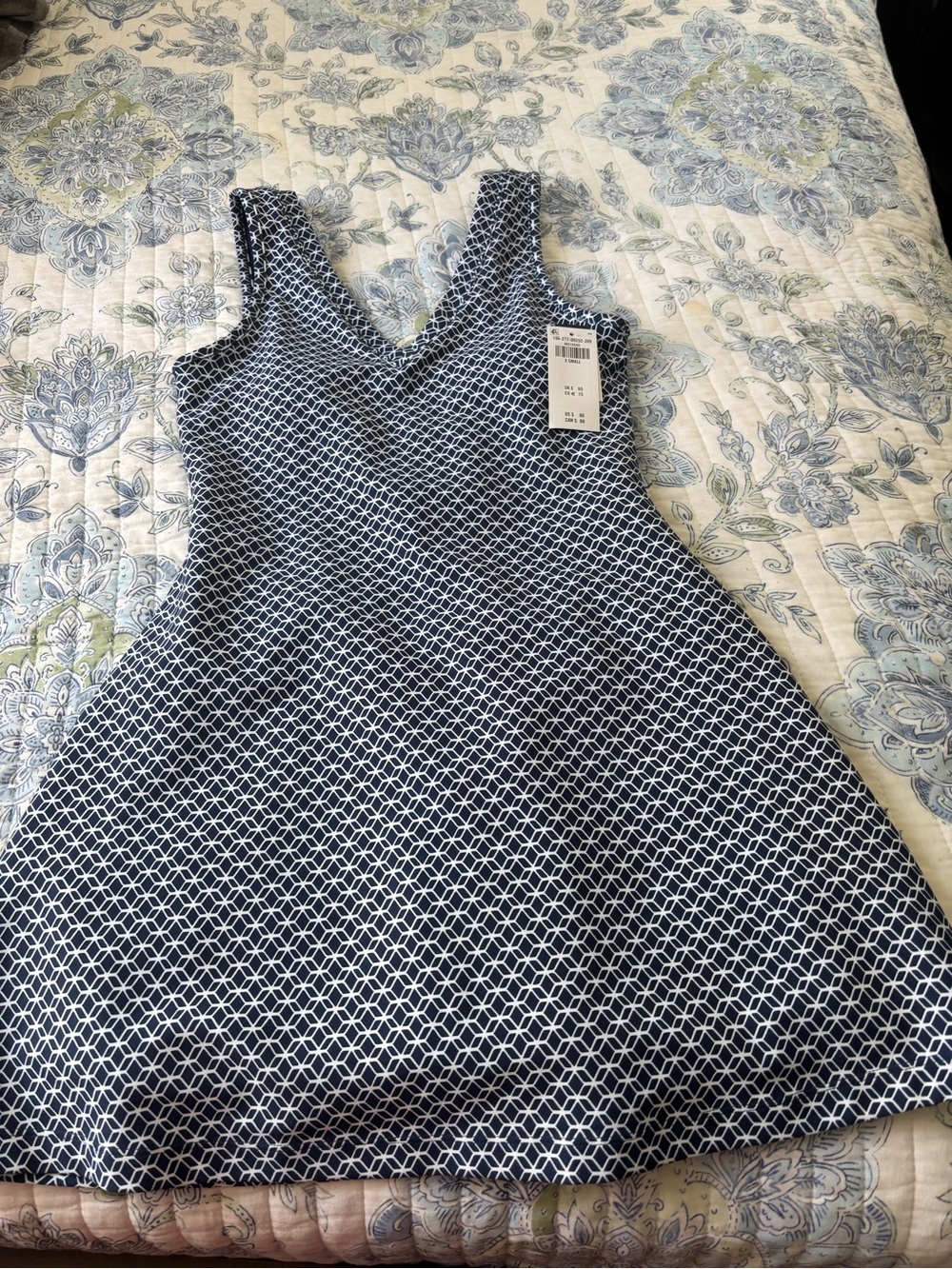 Sleeveless V-Neck Mini Dress in Navy Geo Print